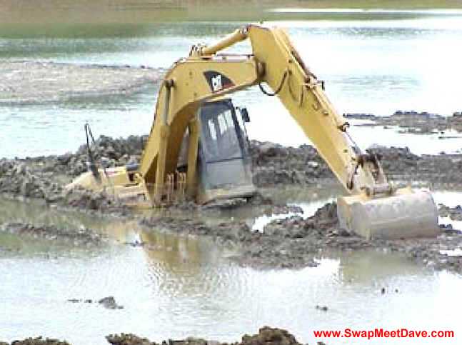 Backhoe sinking.