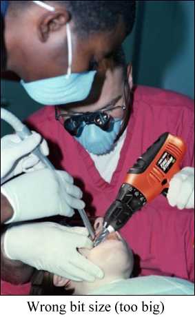 Dentist using large power drill
