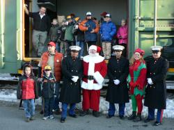 Workers on Toys for Tots train