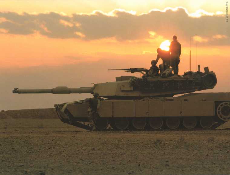 Abrams Tank: Marines with 1st Platoon, A Co., 2nd Tank Bn provide security along the Iraqi-Syrian border.